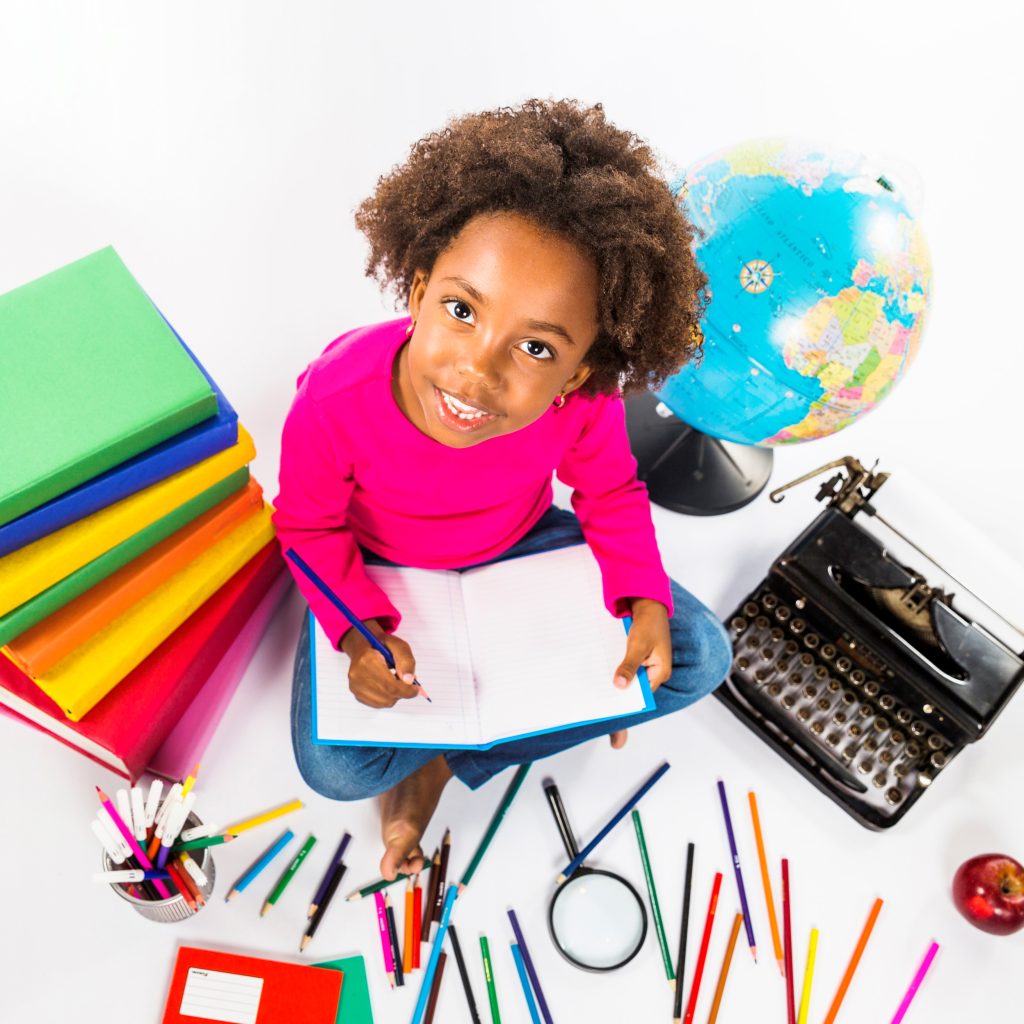 girl-writing-notebook-studio